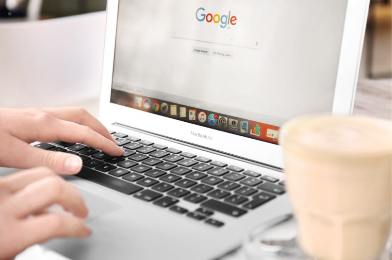 Man work on laptop and search google update